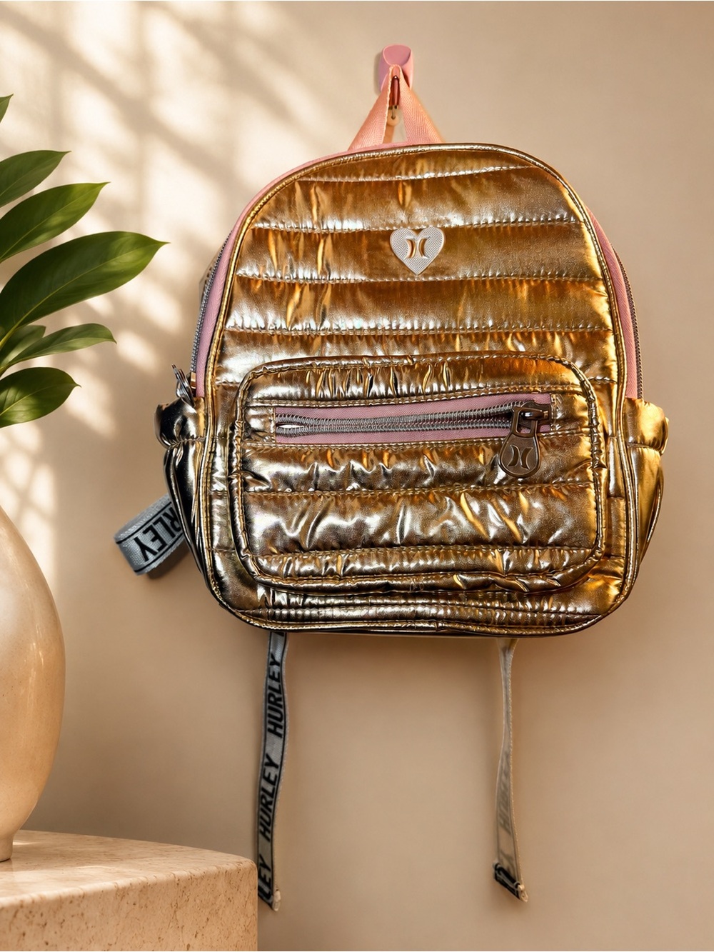 NWOT Hurley Metallic Gold Quilted Mini Backpack with Pink Trim
